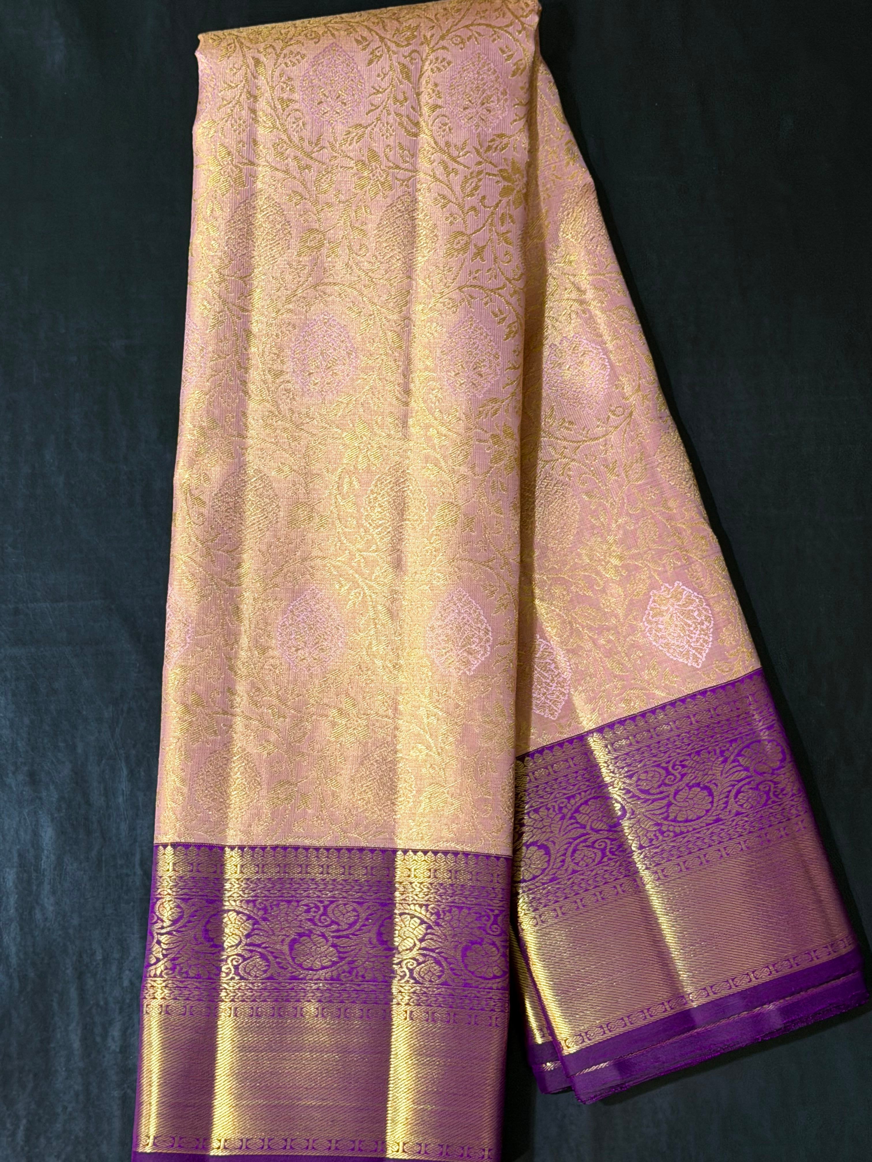 Soft Peach Korvai Kanchipuram Silk Saree with Contrast Purple Zari Border